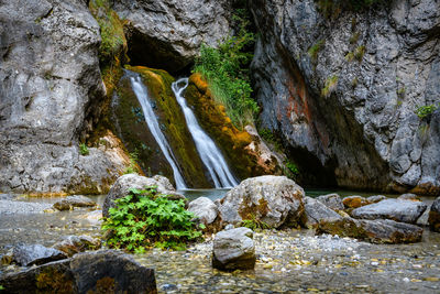 Stream flowing through rocks