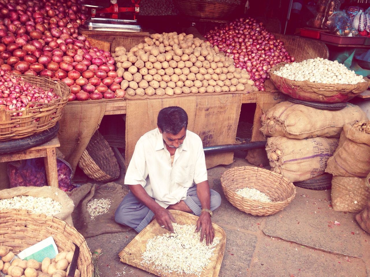 retail, food and drink, for sale, food, abundance, large group of objects, sitting, market, choice, freshness, market stall, lifestyles, casual clothing, small business, variation, healthy eating, stack, basket