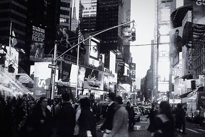 People on city street at night