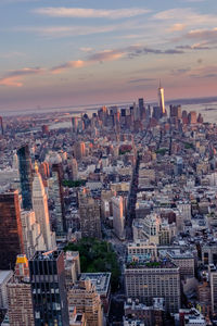 High angle view of city buildings during sunset