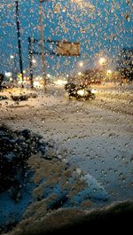 Close-up of water drops on glass