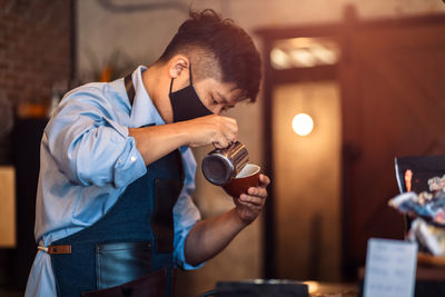 Young man drinking coffee