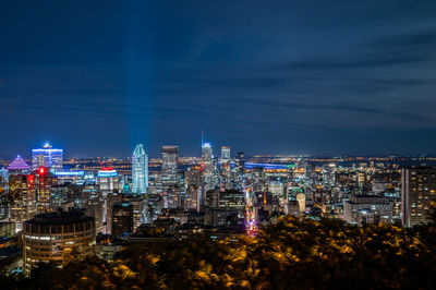 Illuminated buildings in city at night