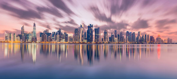 Panoramic skyline of doha, qatar during sunrise