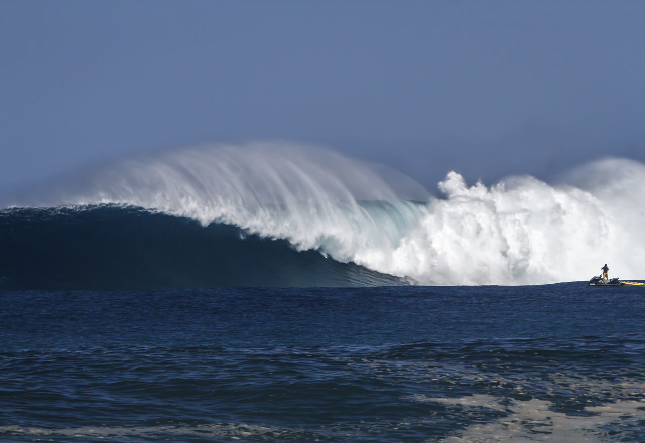 Tow surfing