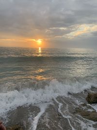 Scenic view of sea against sky during sunset