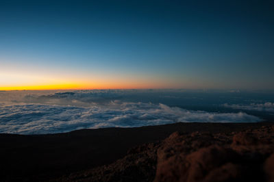 Scenic view of cloudscape against blue sky during sunset