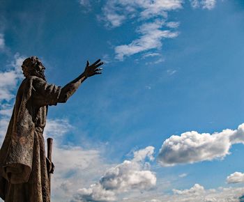 Low angle view of statue against sky
