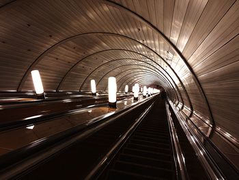 Interior of illuminated subway station