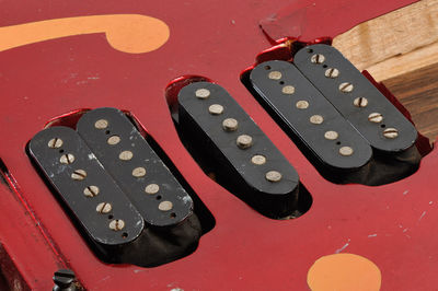 Close-up of broken guitar