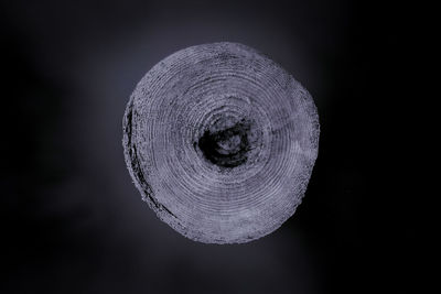 Close-up of crystal ball against black background