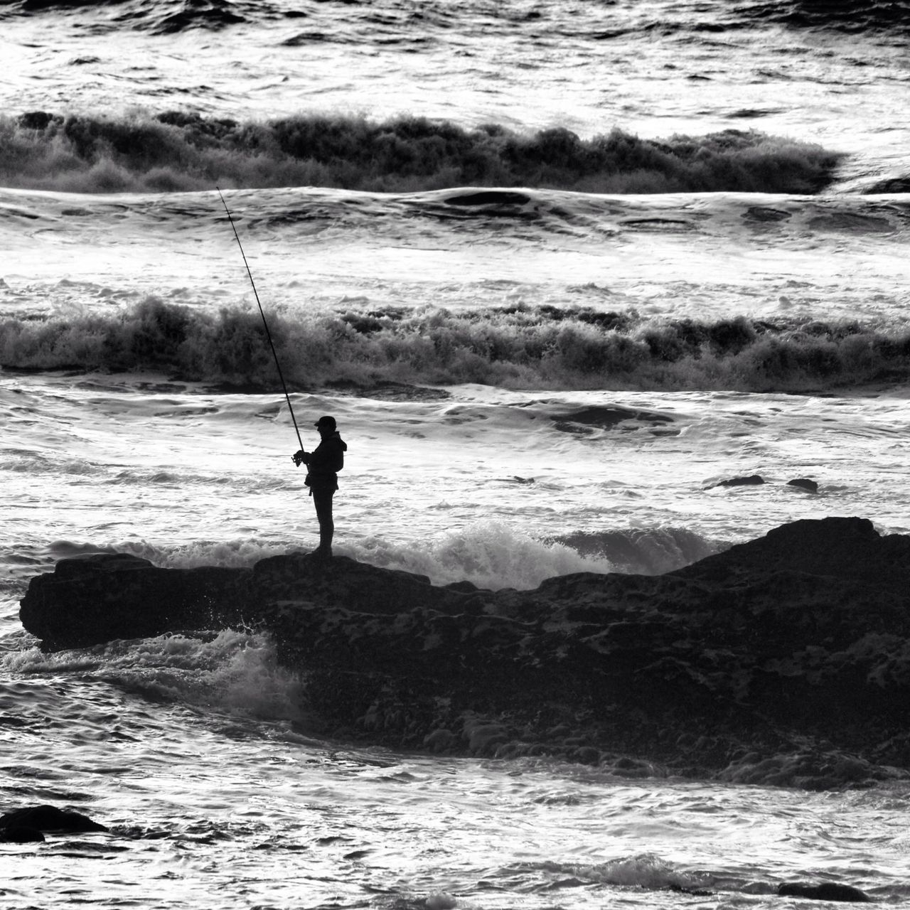 water, sea, wave, leisure activity, lifestyles, full length, surf, beach, silhouette, shore, men, vacations, standing, horizon over water, nature, rippled, surfboard, rear view