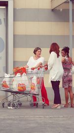 Friends standing in store