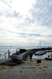 Scenic view of sea against cloudy sky