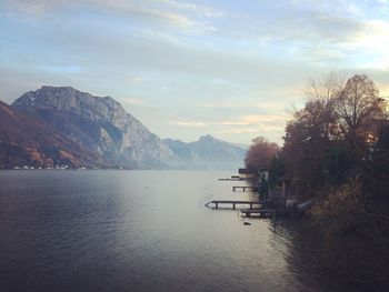 Scenic view of lake against sky during sunset