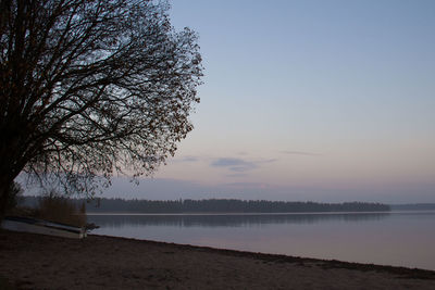 Scenic view of lake at sunset