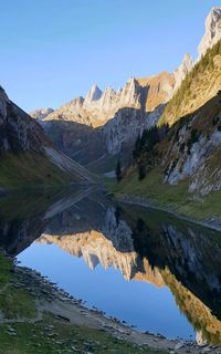 Scenic view of lake and mountains against clear sky fälensee swiss appenzellerland 