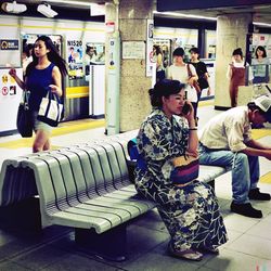 Woman sitting on bench