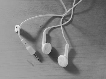 In-ear headphones on table