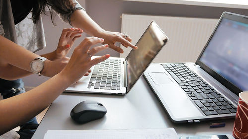 High angle view of woman working on table