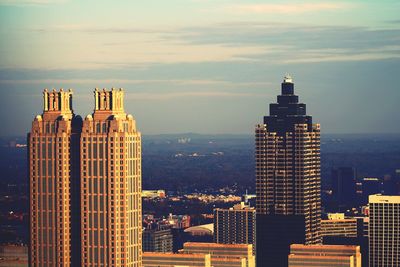 View of skyscrapers at sunset