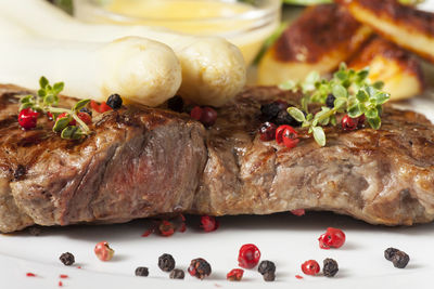 Close-up of grilled meat in plate