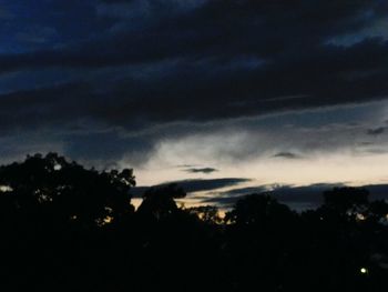 Scenic view of landscape against cloudy sky