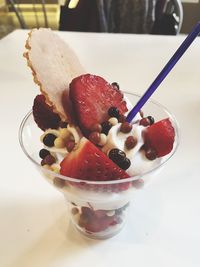 Close-up of ice cream served on table