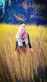 Portrait of happy girl on field