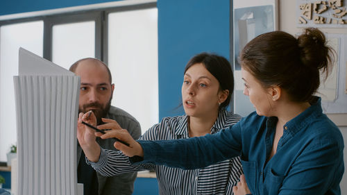 Business colleagues working at office