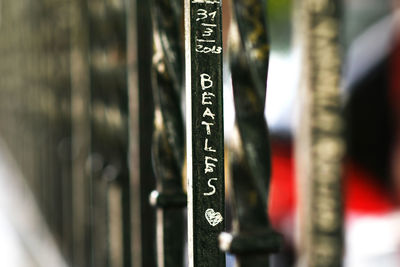 Close-up of text on wood