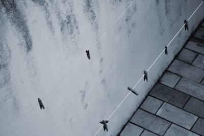 High angle view of clothespin on clothesline