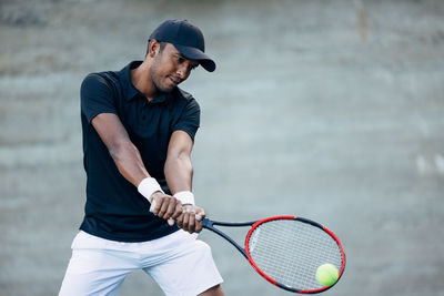 Man playing tennis