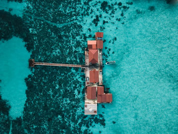 High angle view of sailboat floating on sea