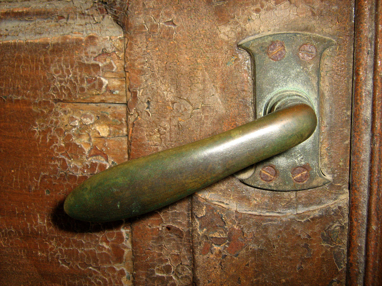 CLOSE-UP OF OLD RUSTY METAL DOOR