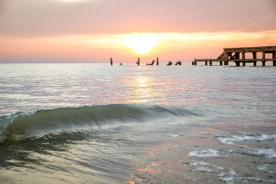 Scenic view of sea against sky during sunset