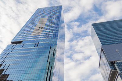 Low angle view of modern buildings against sky