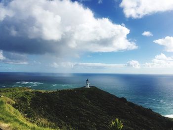 Scenic view of sea against cloudy sky