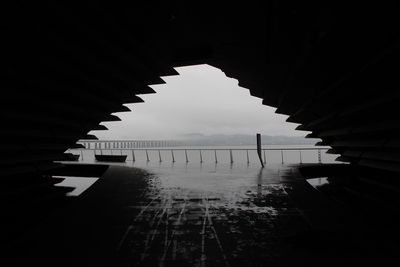 Bridge over buildings against sky