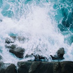 Waves splashing on rocks