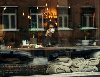 Woman sitting in cafe