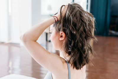 Portrait of beautiful woman at home