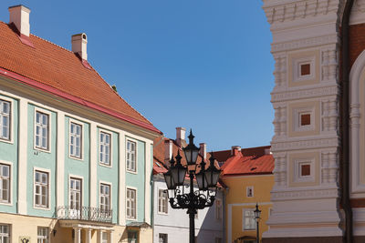 Low angle view of buildings against clear sky