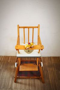 Empty chair on table at home