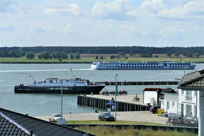 High angle view of pier on river against sky