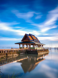 Long exposure shot of lake side pavilion