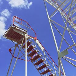 Low angle view of rollercoaster against sky