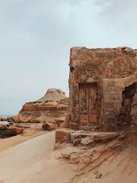 View of old ruin building against sky