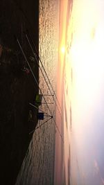 Scenic view of beach against sky during sunset