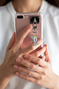 Close-up of woman using mobile phone